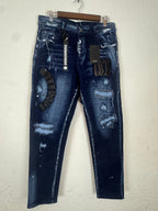 AMIRI distressed graphic denim jeans