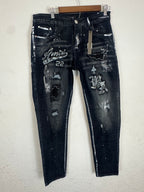 AMIRI distressed varsity patch jeans