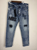 Purple Brand distressed denim jeans.