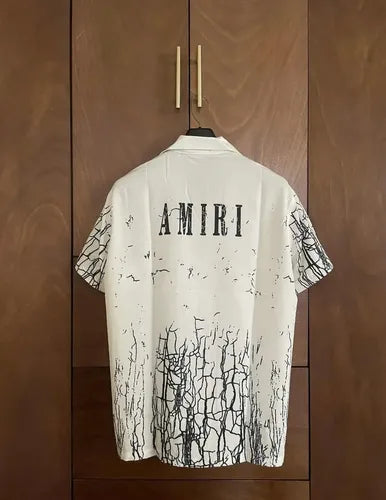 Amiri cracked print button-up Tee