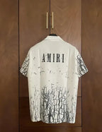 Amiri cracked print button-up Tee