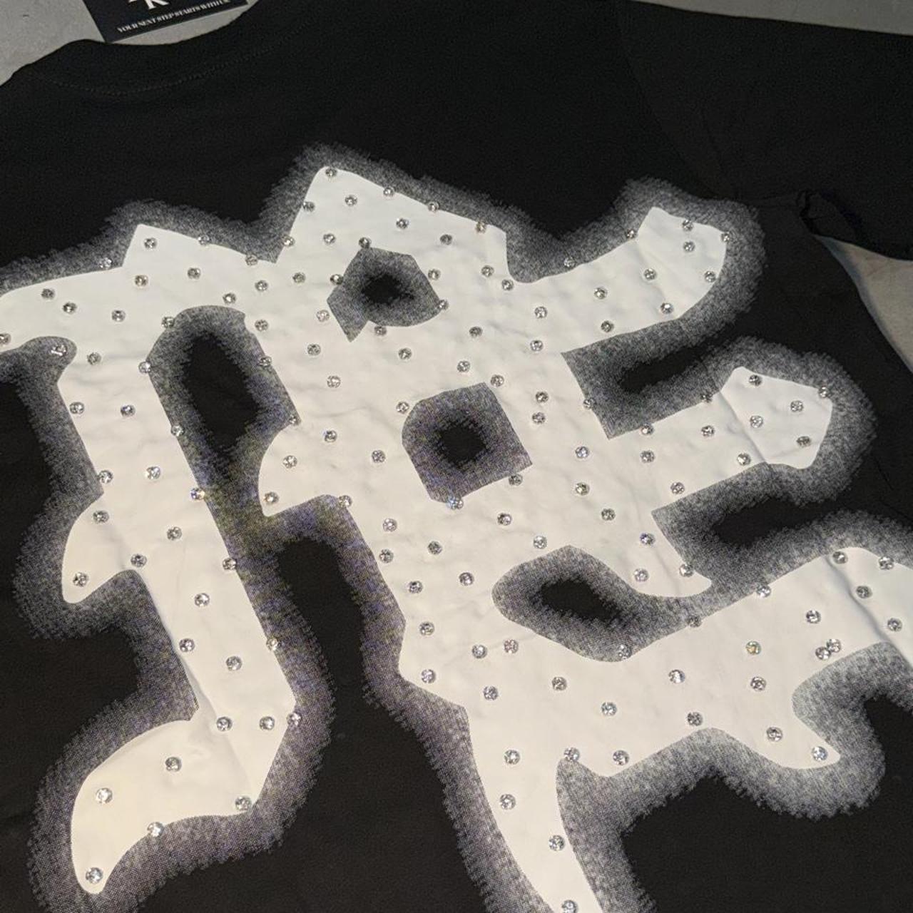 item is the Mixed Emotion "Black End" Rhinestone