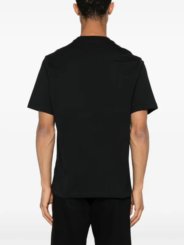 AMIRI Wave Logo Cotton T-Shirt in black.