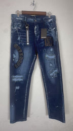 AMIRI distressed graphic denim jeans