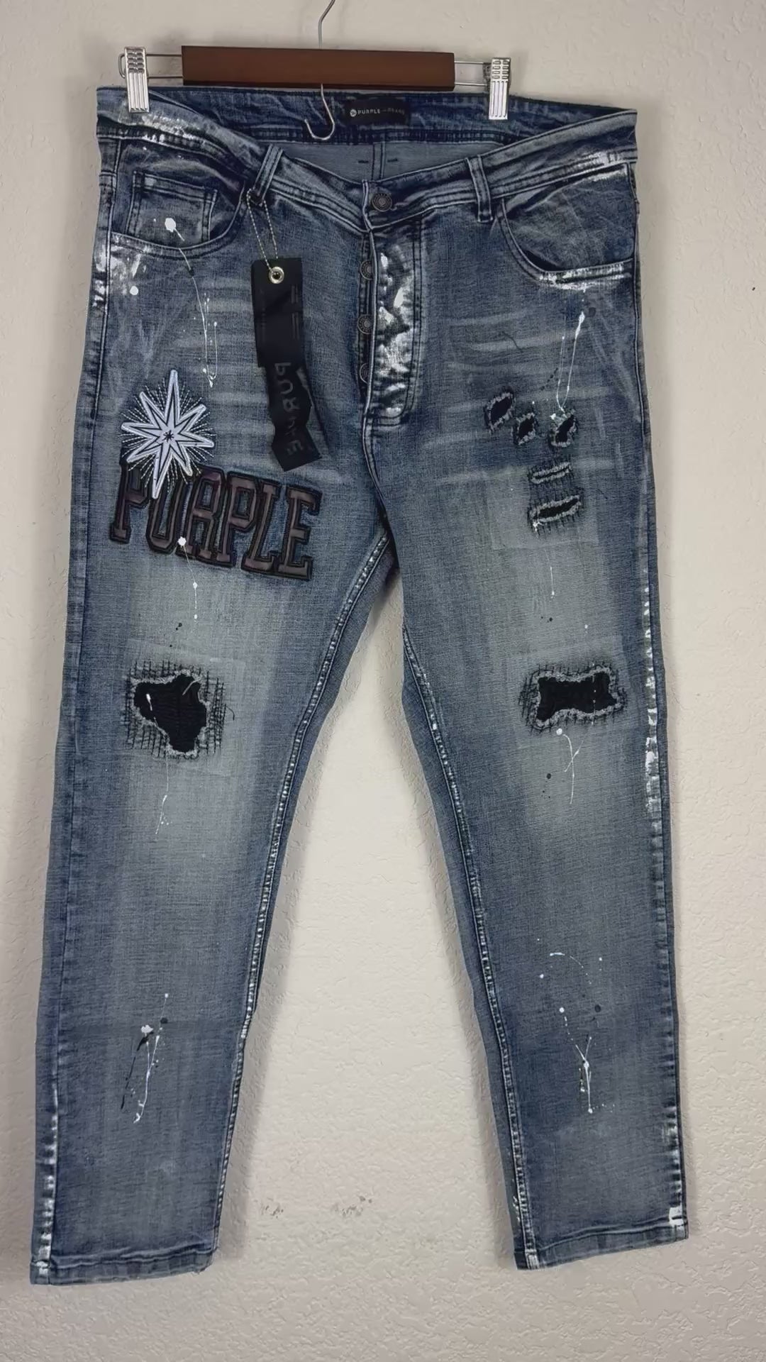 Purple Brand distressed denim jeans.